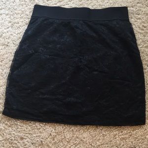 Black lace mini skirt